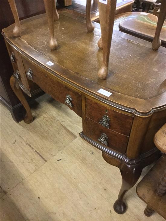 A 1930s walnut writing table